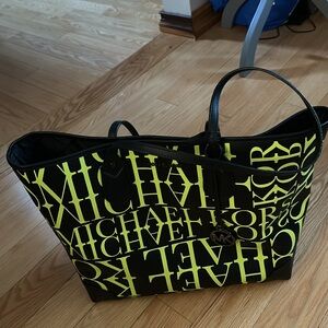 Eva Large Newsprint Logo Leather Tote Bag